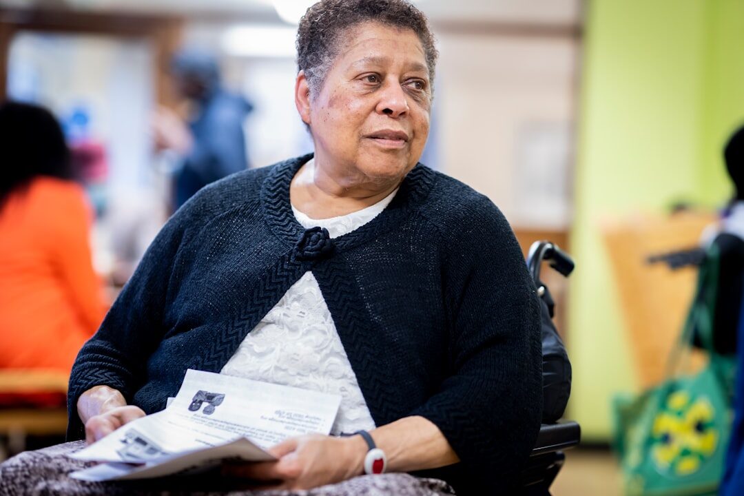 elderly volunteer reading