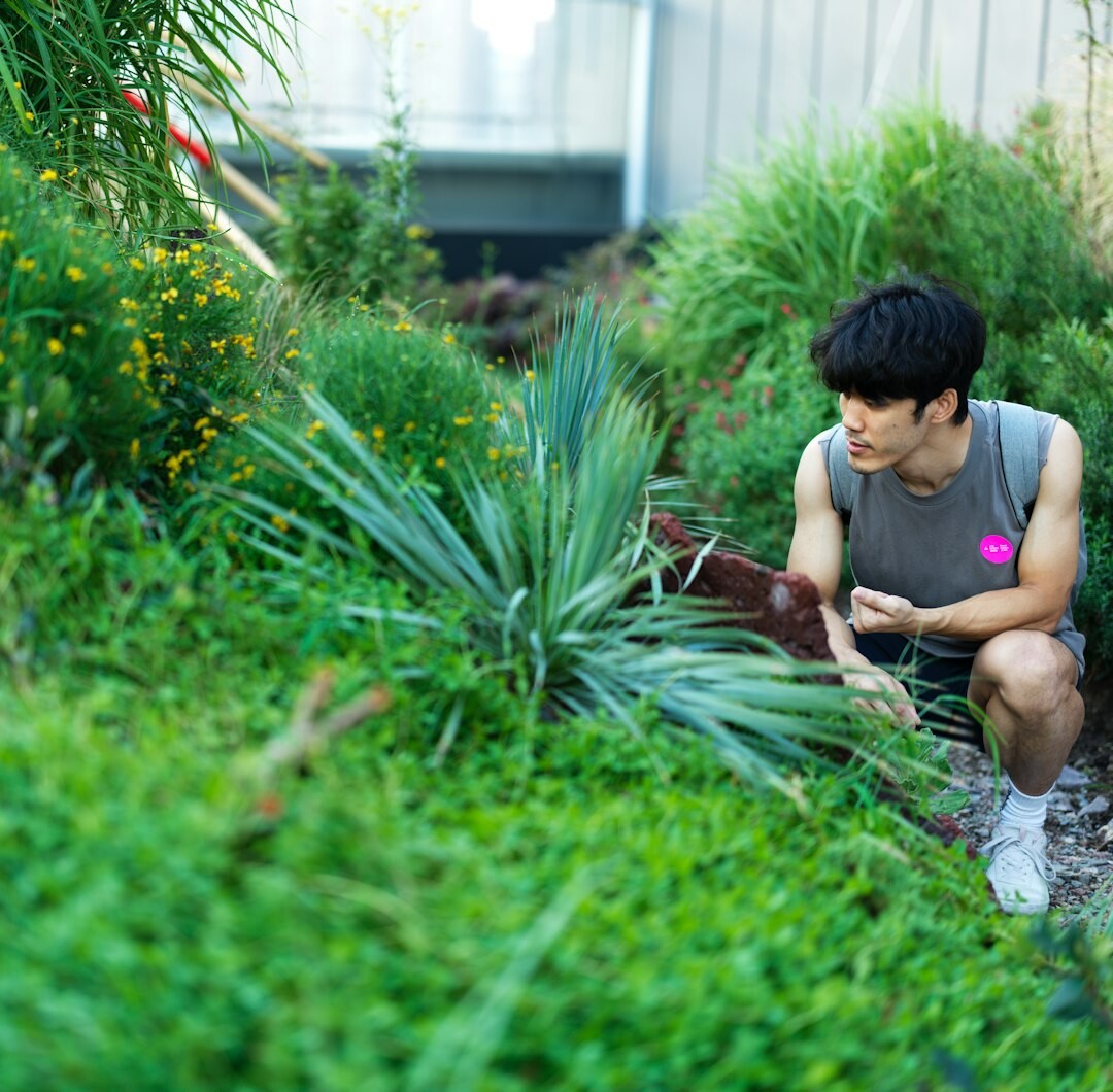 senior reading book in garden