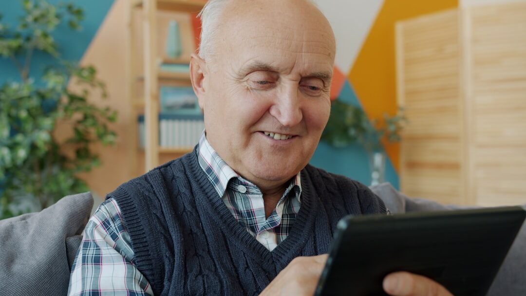elderly using tablet