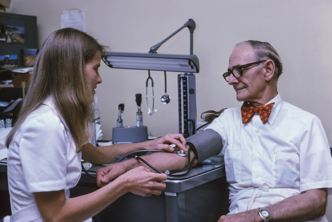 doctor with elderly patient