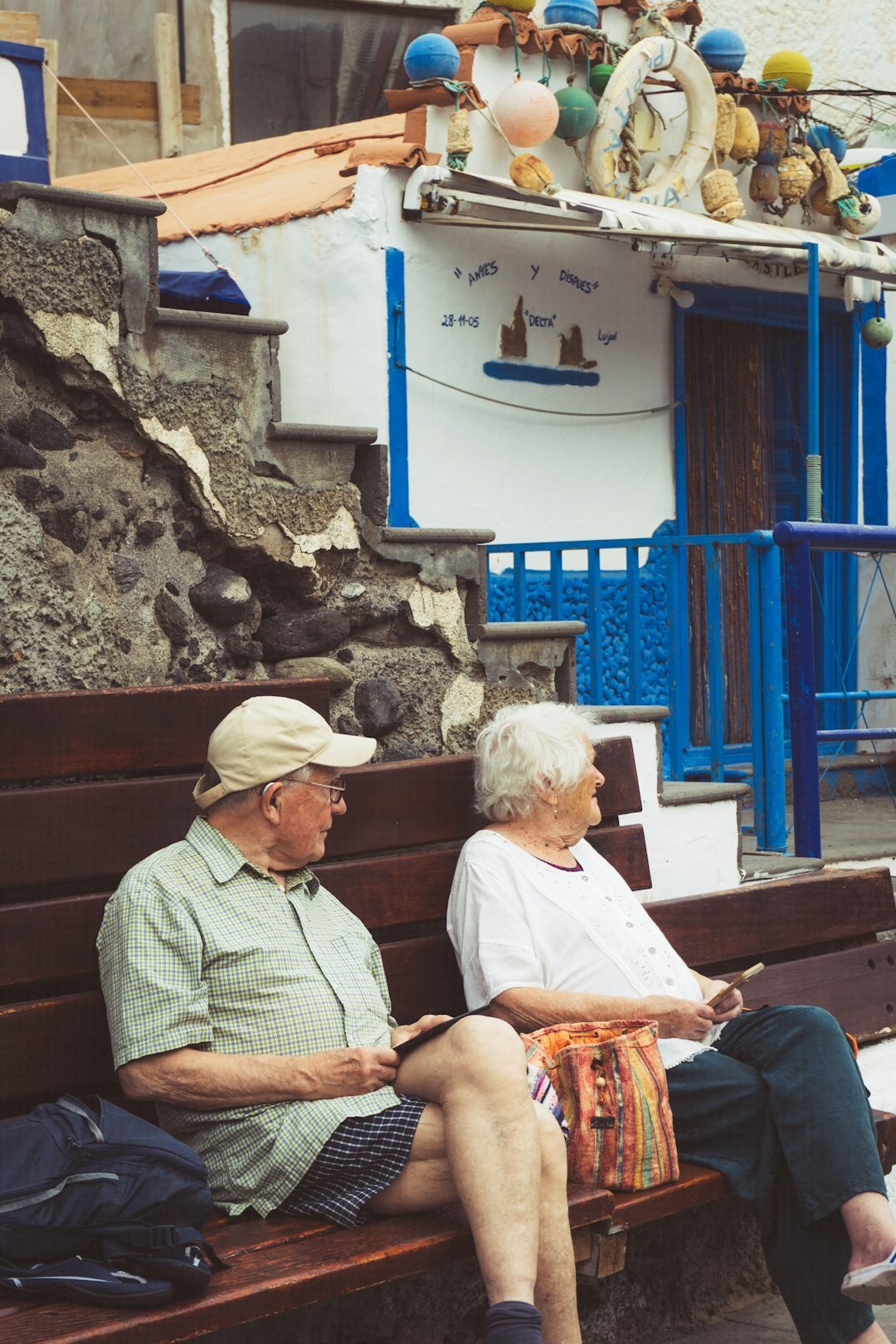 senior couple reading newspaper