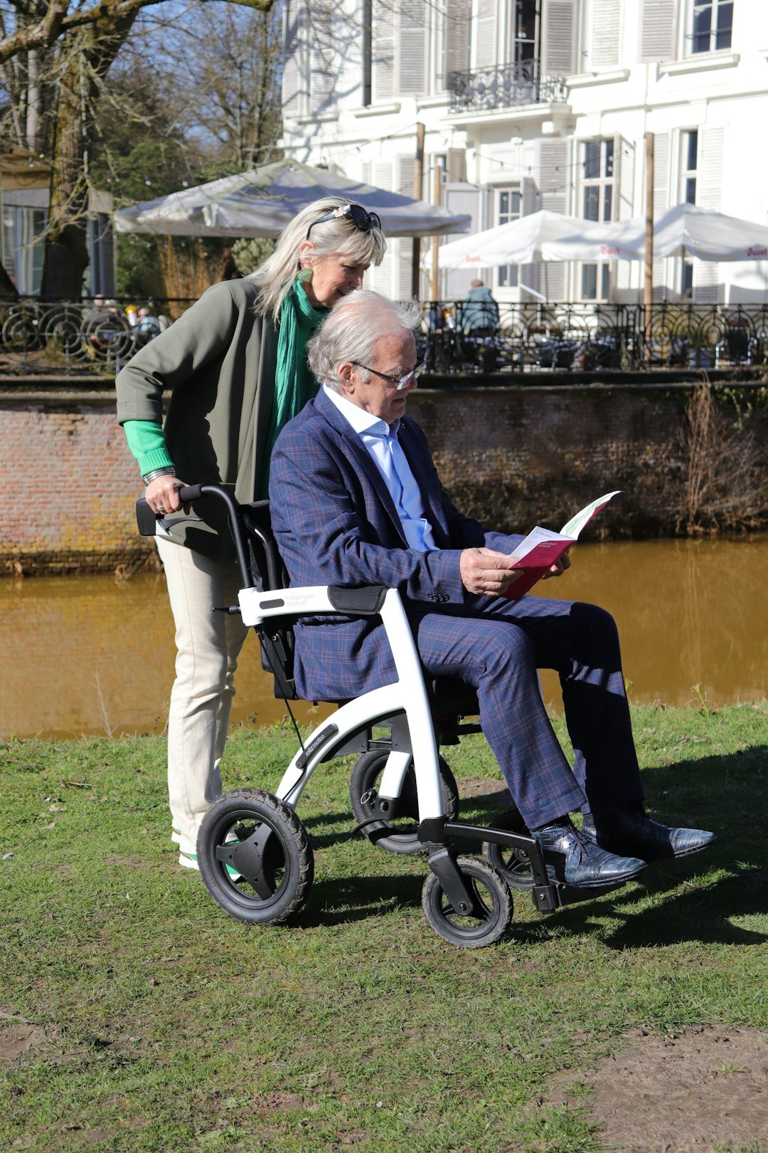 elderly woman reading book